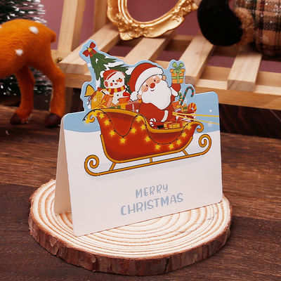 Un bon prix. Des cartes de vœux de Noël sur papier en ligne